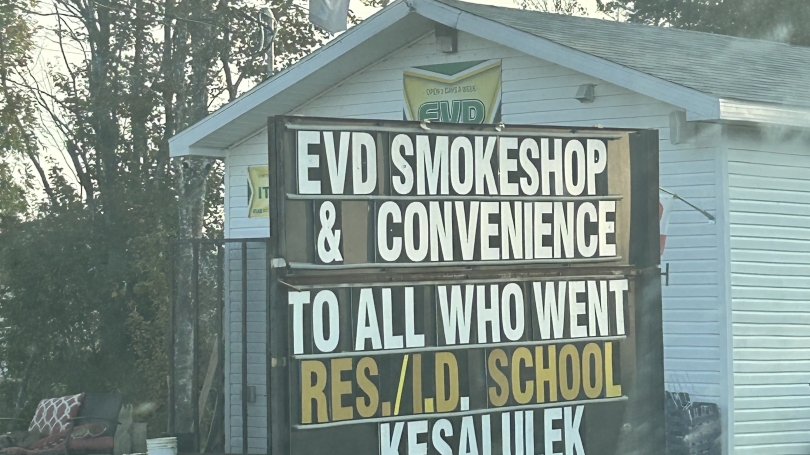 signboard supporting res school survivors